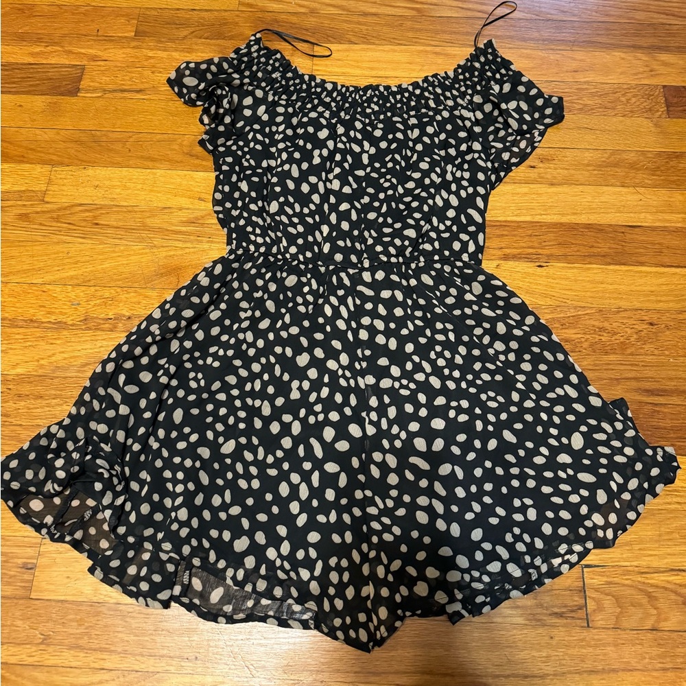 Black and tan polka dot flowy romper